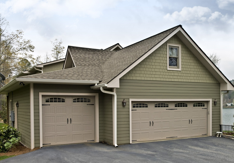 Green modern siding on detached garage